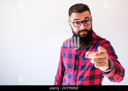 Portrait of man who is pointing. Copy space on image for your text or advert. Stock Photo