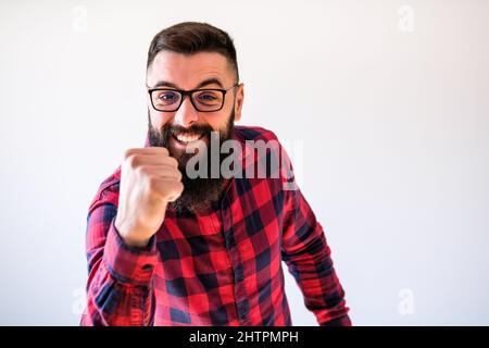 Portrait of man who is ecstatic. Copy space on image for your text or advert. Stock Photo