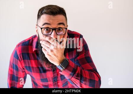 Portrait of man who is shocked and worried. Copy space on image for your text or advert. Stock Photo