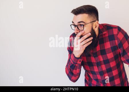 Portrait of man who is shocked and worried. Copy space on image for your text or advert. Stock Photo