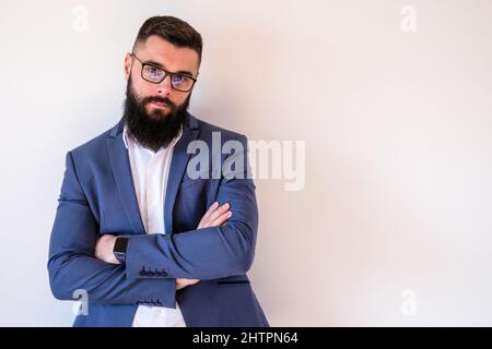 Portrait of pensive businessman. Copy space on image for your text or advert. Stock Photo