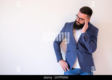 Portrait of businessman who is thoughtful and worried. Copy space on image for your text or advert. Stock Photo