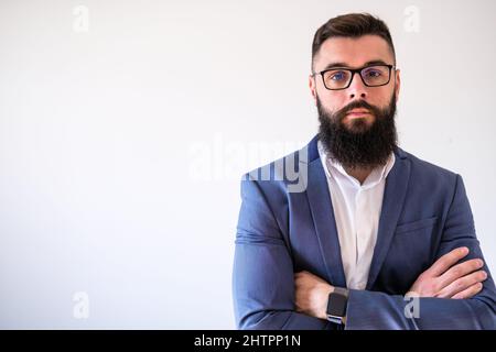 Portrait of pensive businessman. Copy space on image for your text or advert. Stock Photo