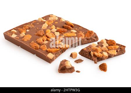 Broken milk salted peanut and caramel chocolate isolated on white. Stock Photo