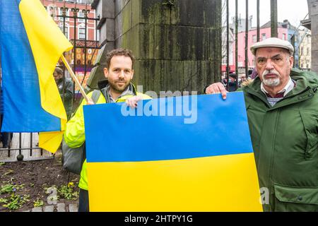 Cork, Ireland. 2nd Mar, 2022. Around 100 people gathered in Bishop Lucey Peace Park in Cork city today, in solidarity with the people of Ukraine. The Cork Lore Mayor, Cllr. Colm Kelleher, laid a wreath and tied a ribbon to the gates of the park. Credit: AG News/Alamy Live News Stock Photo