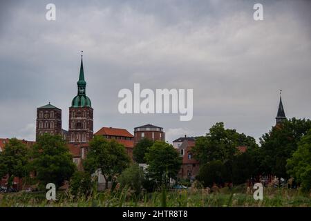 The skyline of the Hanseatic city of Stralsund with the steeples of the St. Nikolai Church Stock Photo