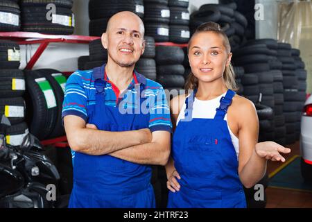 Portrait of two workers in protective overalls Stock Photo