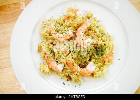 Plated Shrimp Scampi with Wild Rice and Vermicelli Stock Photo