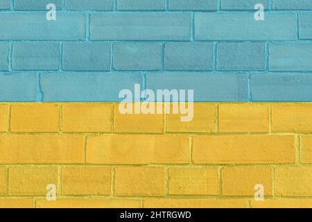 Brick wall in yellow and blue colors Stock Photo