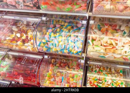 Pick and Mix sweets in plastic storage Stock Photo