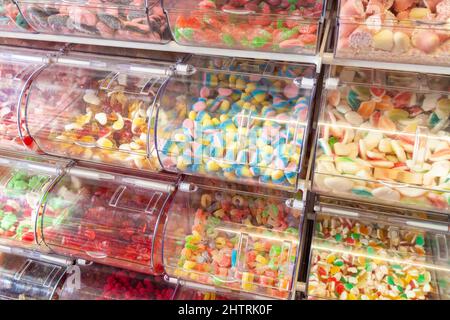 Pick and Mix sweets in plastic storage Stock Photo