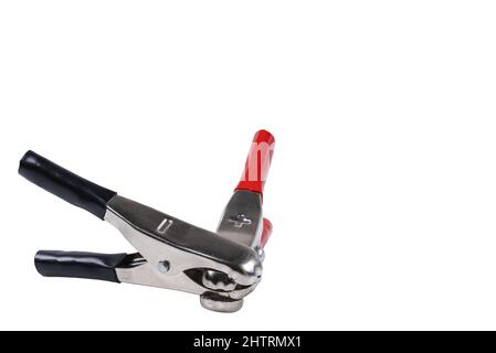 Closeup view of clips for charging battery isolated on white background. Sweden. Stock Photo