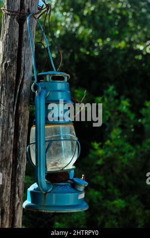 Old Kerosene Lamp. Antique objects collection Stock Photo