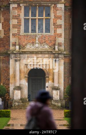 Doddington Hall, Lincoln , Lincolnshire,UK. 2nd Mar 2022.  UK Weather. A wet day at Doddington Hall spring bulb pageant. The spring bulb pageant was started in the 1950s. It is a Elizabethan manor house with Flemish tapestries and walled gardens plus a restaurant, cafe and shop. Credit: Windmill Images/Alamy Live News Stock Photo