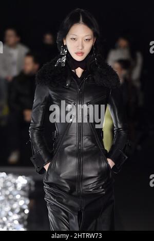 Model Sora Choi walks on the runway during the Louis Vuitton