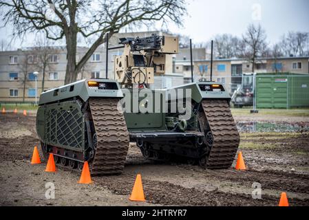 Army soldiers being trained to operate a Milrem Robotics THeMIs UGV Stock Photo