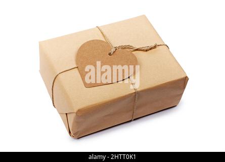 Gift box with blank heart shaped label isolated on white Stock Photo