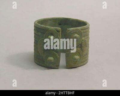 Art inspired by Bracelet, Bronze and Iron Age period, 500 B.C.–A.D 300, Thailand, Bronze, H. 2 3/16 in. (5.6 cm); Diam. 1 7/16 in. (3.7 cm), Metalwork, Classic works modernized by Artotop with a splash of modernity. Shapes, color and value, eye-catching visual impact on art. Emotions through freedom of artworks in a contemporary way. A timeless message pursuing a wildly creative new direction. Artists turning to the digital medium and creating the Artotop NFT Stock Photo