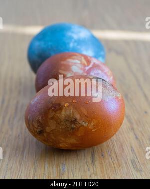 Stockholm, Sweden - April 7, 2021: Three colored eastern egg with focus on the first egg Stock Photo
