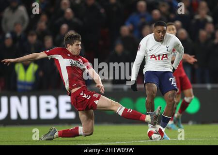 MIDDLESBROUGH, UK. MAR 1ST Middlesbrough's Paddy McNair blocks Steven Bergwijn's attempt on goal during the FA Cup Fifth Round match between Middlesbrough and Tottenham Hotspur at the Riverside Stadium, Middlesbrough on Tuesday 1st March 2022. (Credit: Mark Fletcher | MI News) Credit: MI News & Sport /Alamy Live News Stock Photo