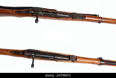 Two Versions of Japanese Arisaka Rifles from WW2. One with Imperial Mum removed and one with intact chrysanthemum Stock Photo