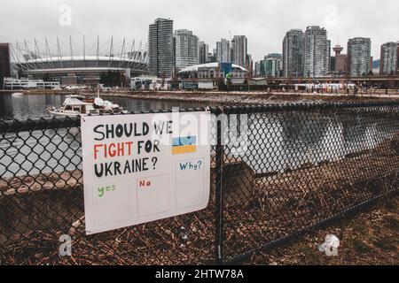 Vancouver, Canada - February 26,2022: View of sign Should we fight for Ukraine in front of Rogers Arena Stock Photo