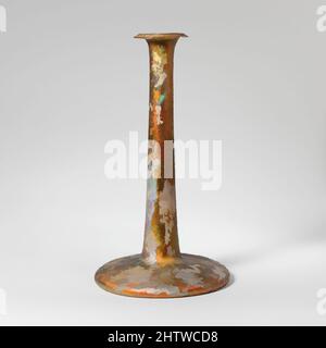 Art inspired by Glass perfume bottle, Mid Imperial, 2nd–3rd century A.D., Roman, Glass; blown, 6 13/16in. (17.3cm), Glass, Candlestick unguentarium. Colorless with greenish tinge. Flaring, downturned rim; cylindrical neck, flaring downward; sides of wide, flat body expanding sharply, Classic works modernized by Artotop with a splash of modernity. Shapes, color and value, eye-catching visual impact on art. Emotions through freedom of artworks in a contemporary way. A timeless message pursuing a wildly creative new direction. Artists turning to the digital medium and creating the Artotop NFT Stock Photo