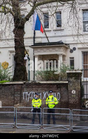 London, UK - March 2nd 2022: Police officers outside the Russian Embassy in London, UK. Stock Photo