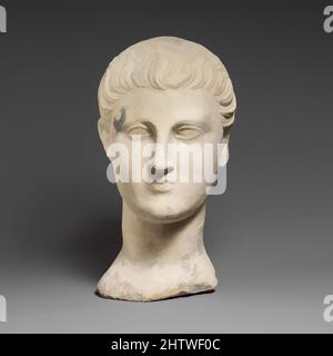Art inspired by Limestone funerary bust of a beardless man, Early Roman, Cypriot, Limestone, Overall: 9 1/4 x 4 7/8 x 5 1/2 in. (23.5 x 12.4 x 14 cm), Stone Sculpture, The youthful face has a smiling expression. The fine features are well executed except for the ears. Comma-shaped, Classic works modernized by Artotop with a splash of modernity. Shapes, color and value, eye-catching visual impact on art. Emotions through freedom of artworks in a contemporary way. A timeless message pursuing a wildly creative new direction. Artists turning to the digital medium and creating the Artotop NFT Stock Photo
