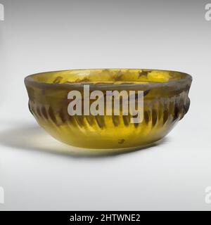 Art inspired by Glass ribbed bowl, Late Hellenistic, 1st century B.C., Greek, Eastern Mediterranean, Glass; cast, tooled, and cut, H.: 2 3/16 in. (5.6 cm), Glass, Translucent yellow green., Outsplayed rim, with upright rounded edge and plain inward-sloping band below; convex side, Classic works modernized by Artotop with a splash of modernity. Shapes, color and value, eye-catching visual impact on art. Emotions through freedom of artworks in a contemporary way. A timeless message pursuing a wildly creative new direction. Artists turning to the digital medium and creating the Artotop NFT Stock Photo