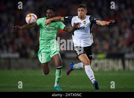 Valencia, Spain. 2nd Mar, 2022. Valencia's Gabriel Paulista vies with  Athletic Bilbao's Inaki Williams during the King Cup semifinal second leg  match between Valencia and Athletic Bilbao in Valencia, Spain, March 2, 2022.  Credit: Str/Xinhua/Alamy Live News