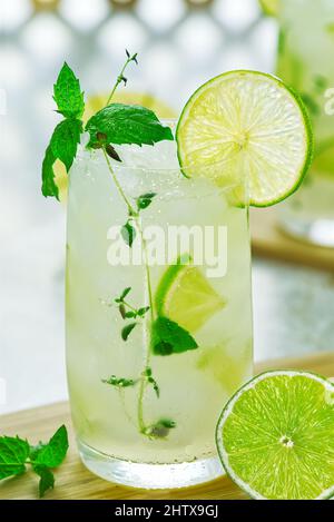 Ginger Ale or Kombucha in glass Homemade cocktail lime and ginger limonade. Indian drink to refresh Stock Photo