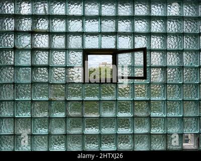 Glass block wall with window Stock Photo