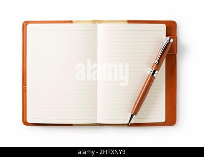 Leather notebook and pen placed against a white background. Business image. View from directly above. Stock Photo