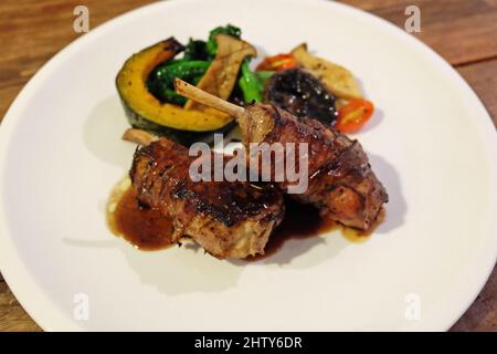 Close up Lamb shrank with grilled vegetables Stock Photo