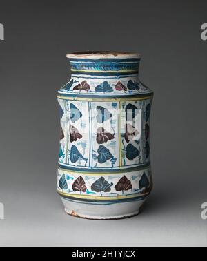 Art inspired by Pharmacy Jar, 1450–70, Made in Montelupo, Tuscany, Italy, Italian, Tin-glazed earthenware, Overall: 9 1/8 x 5 9/16 in. (23.1 x 14.2 cm), Ceramics, The ivy-leaf pattern is derived from Valencian lusterware, which was imported into Tuscany in large quantities during the, Classic works modernized by Artotop with a splash of modernity. Shapes, color and value, eye-catching visual impact on art. Emotions through freedom of artworks in a contemporary way. A timeless message pursuing a wildly creative new direction. Artists turning to the digital medium and creating the Artotop NFT Stock Photo