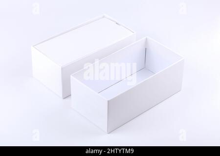 Simple blank white opened empty smartphone box premium quality paper mobile phone technology product container isolated on white background, cut out, Stock Photo