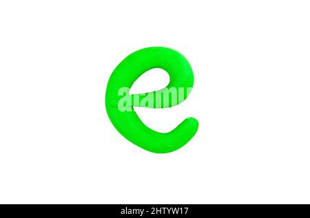 Single creative green colored letter E made from plasticine, isolated on white, cut out, object closeup, nobody. Ecology, green energy, power conserva Stock Photo