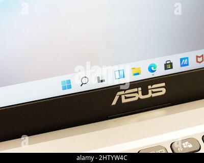Microsoft Windows 11 operating system on an Asus laptop, start menu task bar closeup, nobody. New Win 11 OS version user interface, system upgrade con Stock Photo
