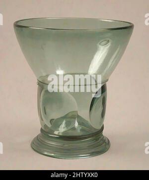 Art inspired by Beaker, mid-16th century, German, Glass, Overall: 4 7/16 x 4 1/16 in. (11.2 x 10.3 cm), Glass-Vessels, Classic works modernized by Artotop with a splash of modernity. Shapes, color and value, eye-catching visual impact on art. Emotions through freedom of artworks in a contemporary way. A timeless message pursuing a wildly creative new direction. Artists turning to the digital medium and creating the Artotop NFT Stock Photo