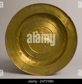 Art inspired by Dish, early 16th century, German, Brass, Overall: 17 x 1 7/8 in. (43.2 x 4.7 cm), Metalwork-Brass, Classic works modernized by Artotop with a splash of modernity. Shapes, color and value, eye-catching visual impact on art. Emotions through freedom of artworks in a contemporary way. A timeless message pursuing a wildly creative new direction. Artists turning to the digital medium and creating the Artotop NFT Stock Photo