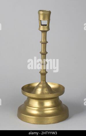 Art inspired by Candlestick, 15th century, German, Brass, Height: 10 in. (25.4 cm), Metalwork-Brass, Classic works modernized by Artotop with a splash of modernity. Shapes, color and value, eye-catching visual impact on art. Emotions through freedom of artworks in a contemporary way. A timeless message pursuing a wildly creative new direction. Artists turning to the digital medium and creating the Artotop NFT Stock Photo