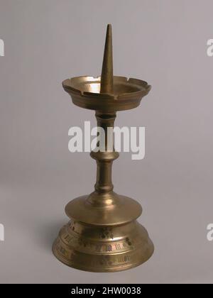 Art inspired by Pricket Candlestick, ca. 1445, French, Brass, Overall: 12 7/8 x 5 15/16 in. (32.7 x 15.1 cm), Metalwork-Brass, Classic works modernized by Artotop with a splash of modernity. Shapes, color and value, eye-catching visual impact on art. Emotions through freedom of artworks in a contemporary way. A timeless message pursuing a wildly creative new direction. Artists turning to the digital medium and creating the Artotop NFT Stock Photo