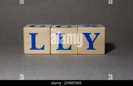 January 19, 2022. New York, USA. Exchange Ticker symbol of Eli Lilly and Company LLY made of wooden cubes on a gray background. Stock Photo