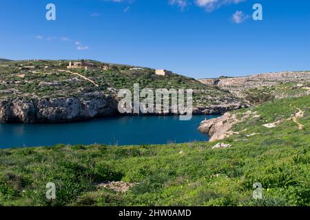 The bay and low cliffs of the drowned ria valley of Mgarr ix-Xini, in the island of Gozo, Malta Stock Photo