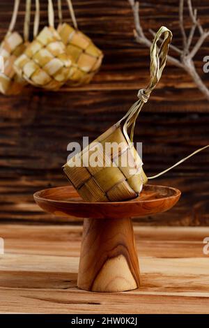 Ketupat Lebaran  is a special dish served at Eid Mubarak  Ied Fitr celebration in Indonesia. Ketupat is is a type of dumpling made from rice packed in Stock Photo