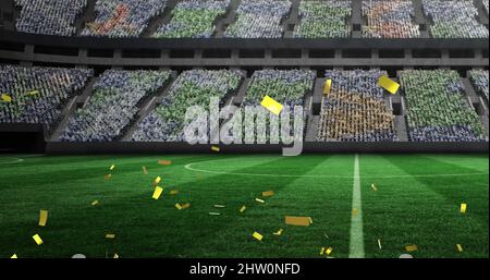 Image of gold confetti falling over sports stadium Stock Photo