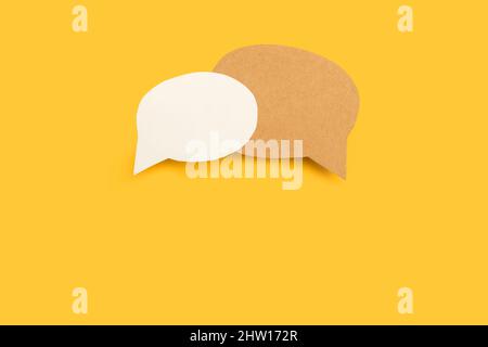 Blank speech bubbles with copy space on a yellow background Stock Photo