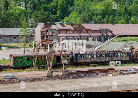 Spain, Aragon, Huesca, Canfranc, International Railway Station (altitude 1200 meters), wrecks of wagons from the old Pau-Zaragoza railway line, abandoned since 1970, rehabilitation of the station in progress to transform it into a luxury hotel Stock Photo
