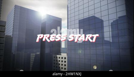 Image of press start over skyscrapers Stock Photo